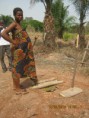 A woman at a rural water source documented in NIWA’s programme archive